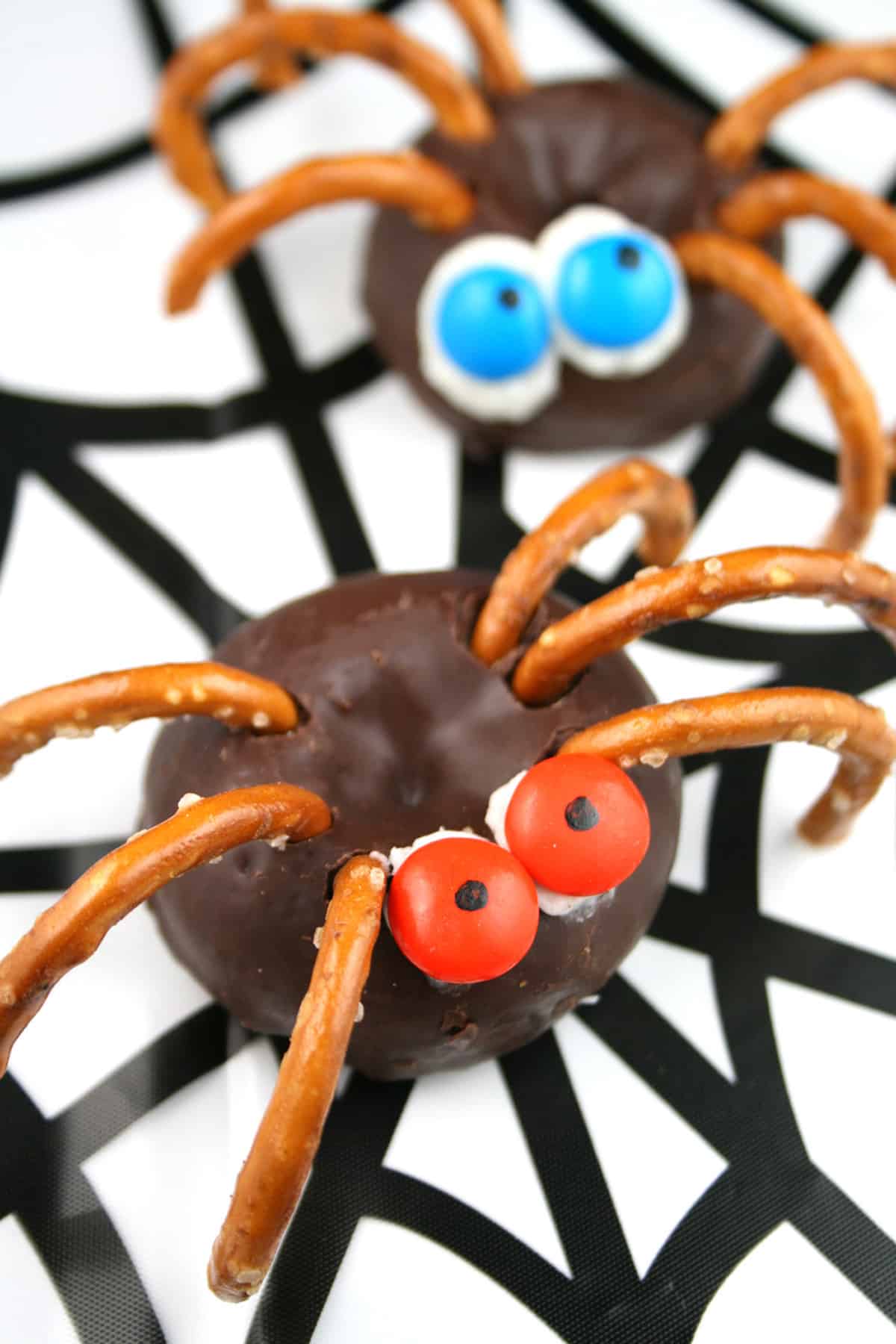 No bake donuts decorated to look like spooky spiders.