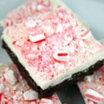 Peppermint bark brownies cut into squares.