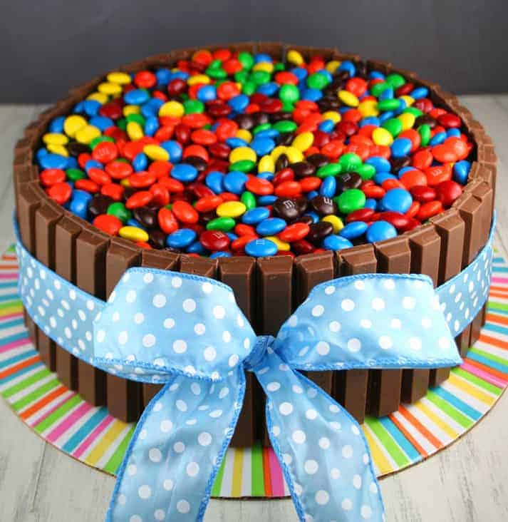 Buckets of M&M's Kit Kat Birthday Cake Recipe - Mom Loves Baking