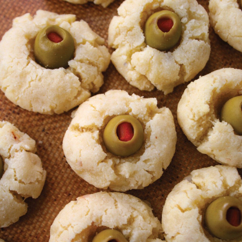 Savory cheese cookies with an olive in the center.