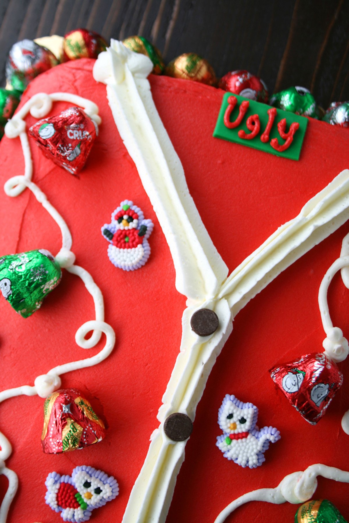 Ugly sweater cake with candy.