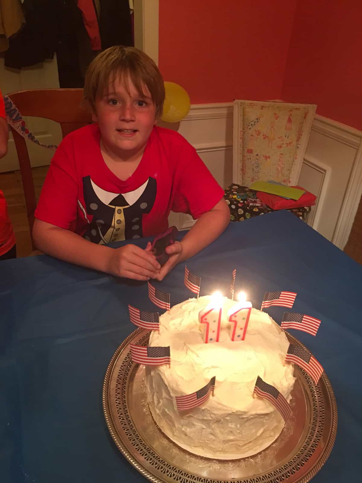 Birthday boy with his 11th birthday cake.