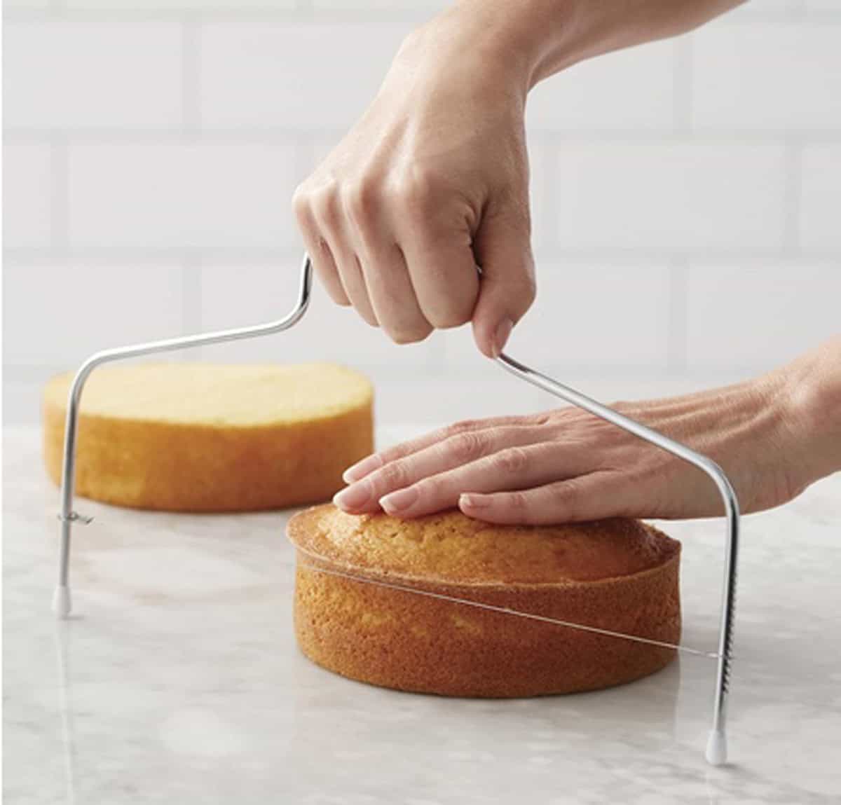 Wilton cake leveler used to cut cake layers horizontally.