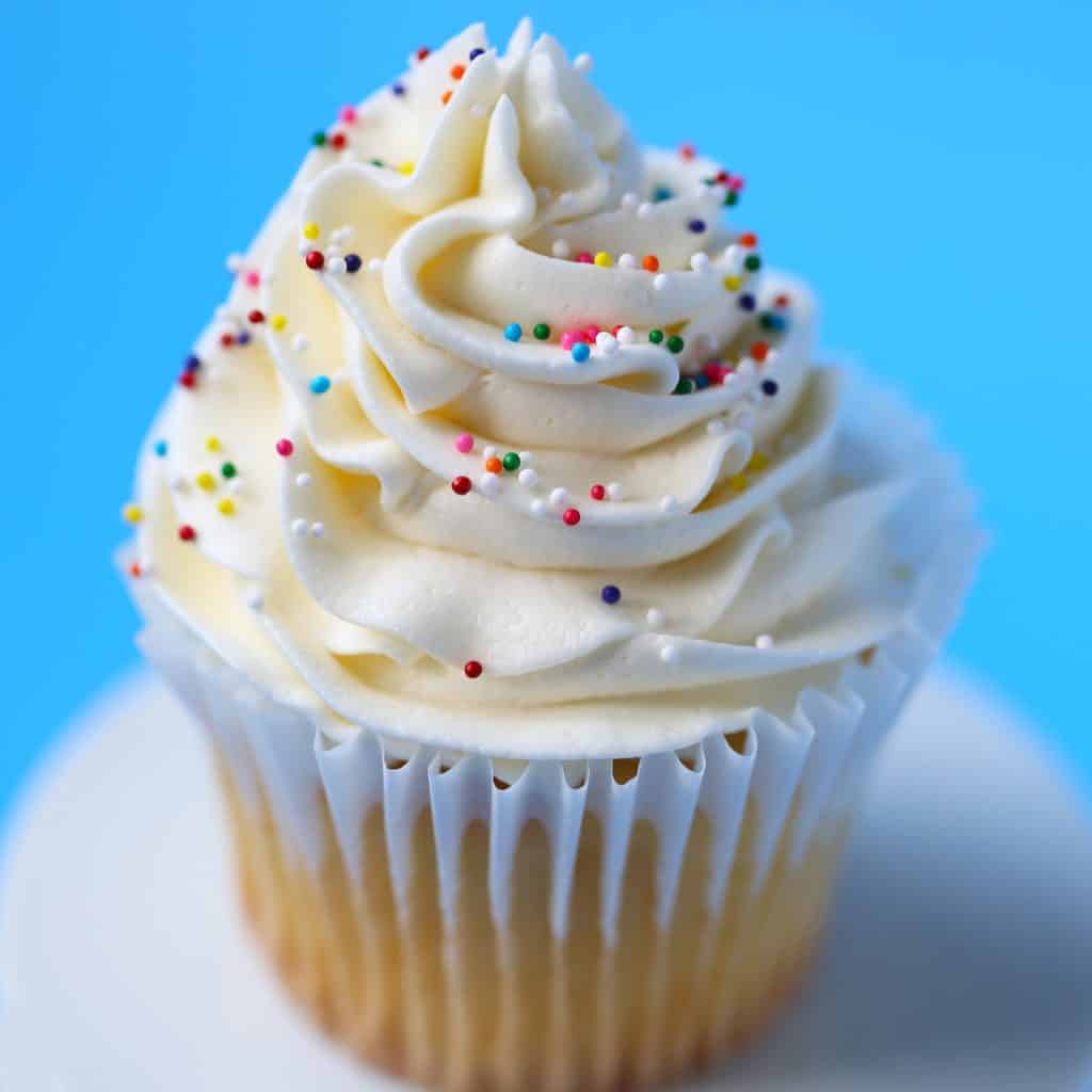 Vanilla buttercream swirl of frosting on cupcake