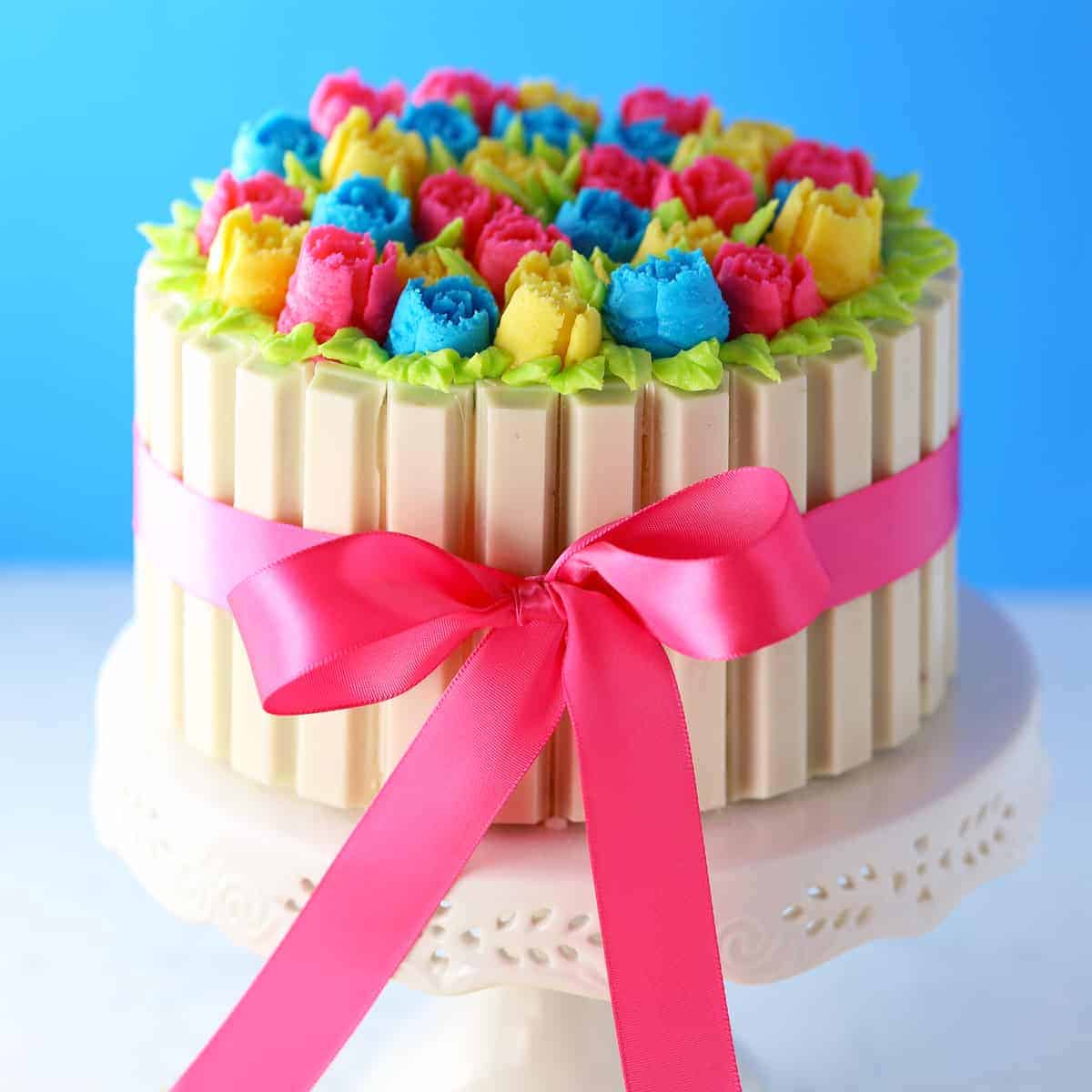 Lv Birthday Cake With White Chocolate Bow.jpg