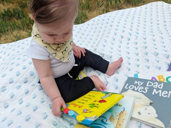 baby reading a book