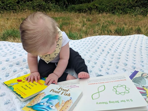 baby reading a book