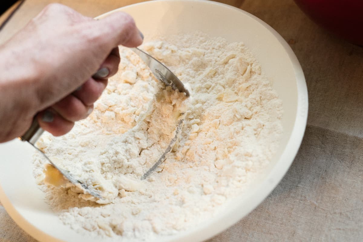 Making apple pie crumble topping.