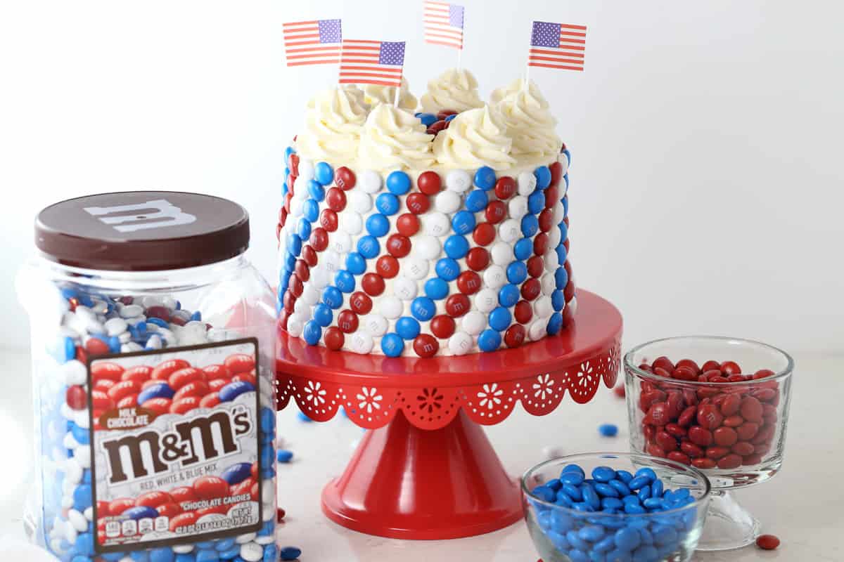 Close-up of red, white, and blue candy stripe cake, perfect for July 4th celebrations.