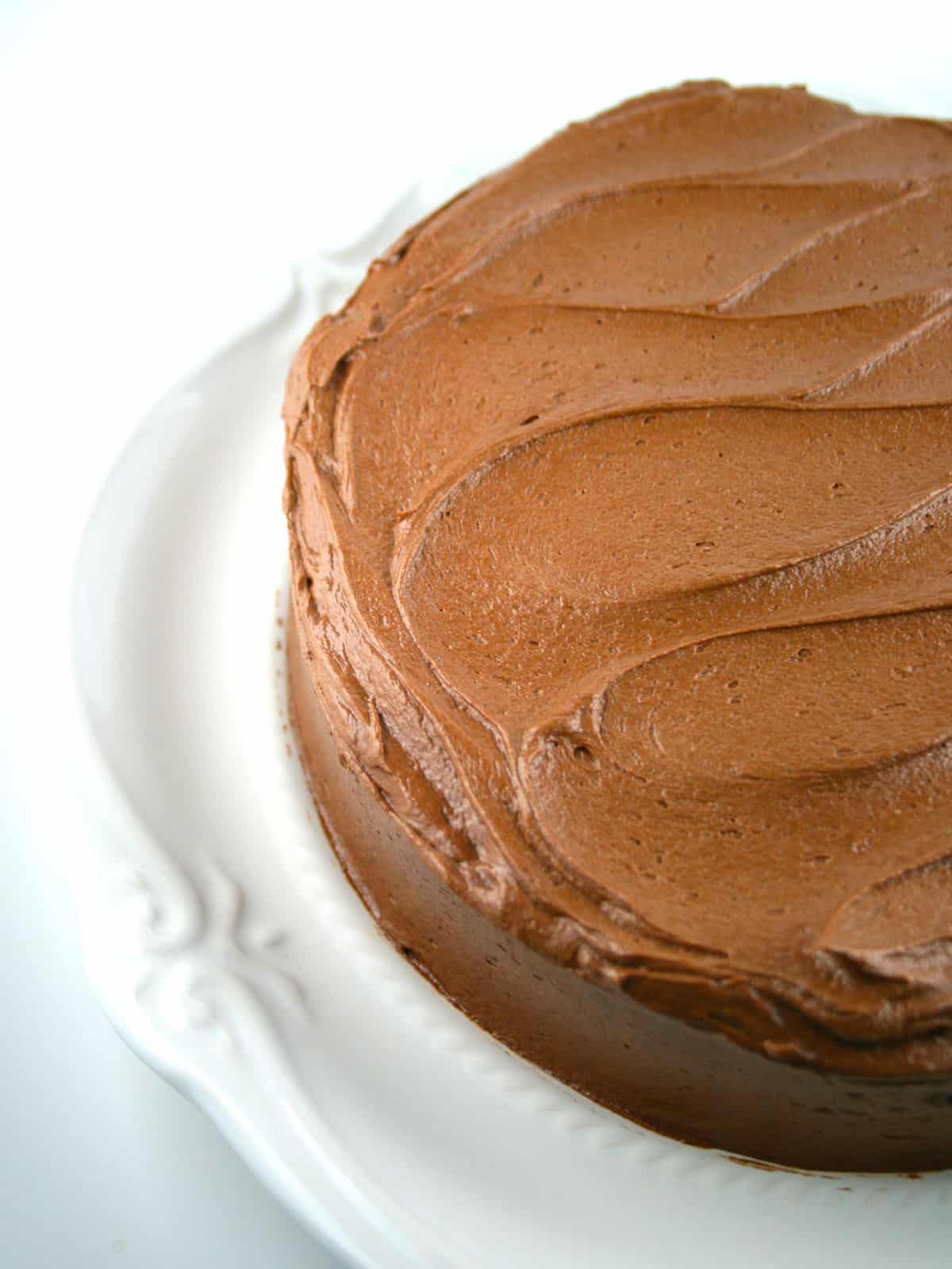 Frosted chocolate cake with no piping.