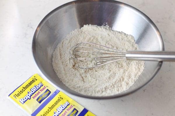 Mixing flour for homemade pizza dough