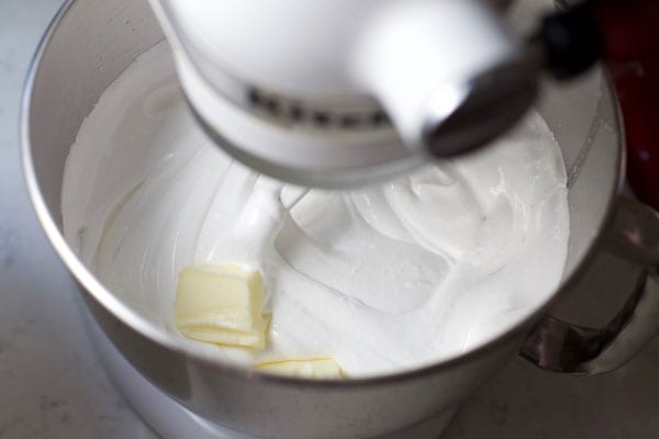 Add butter to meringue
