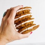 Hand holding oatmeal cream pies