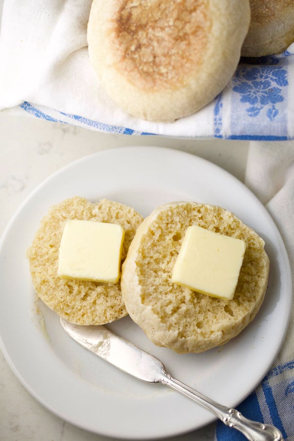 Buttered English muffin on plate