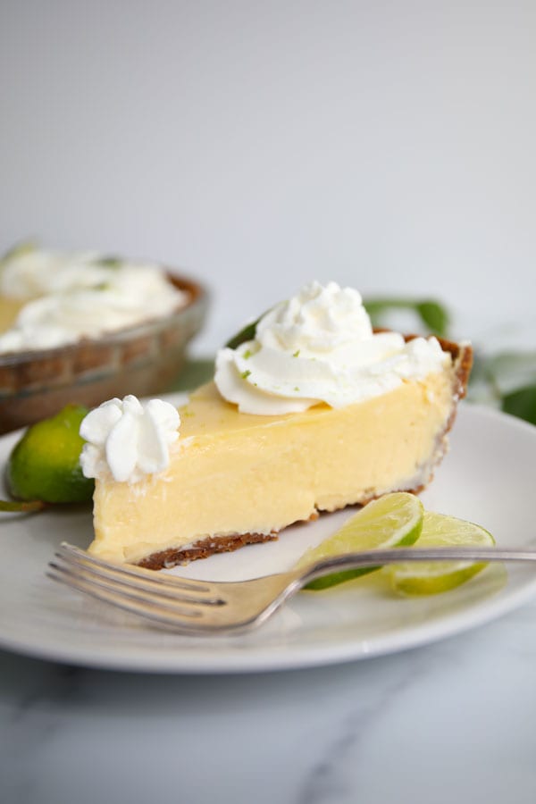 Classic Key Lime Pie with Whipped Cream pie slice