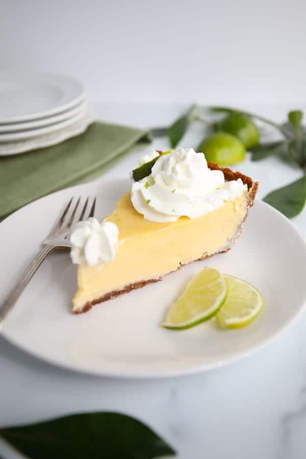 Slice of Classic Key Lime Pie with Whipped Cream