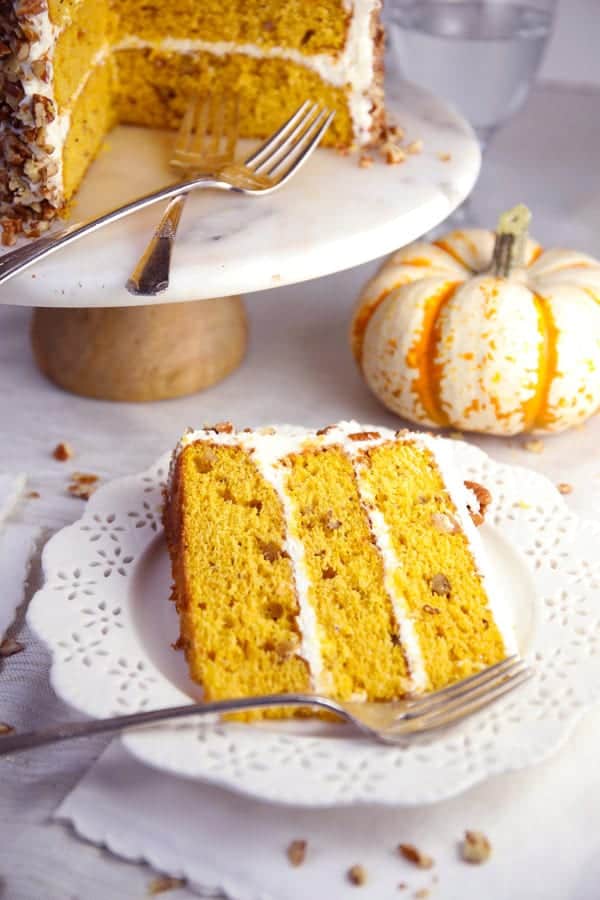 Pumpkin spice pecan layer cake with cream cheese frosting cake slice