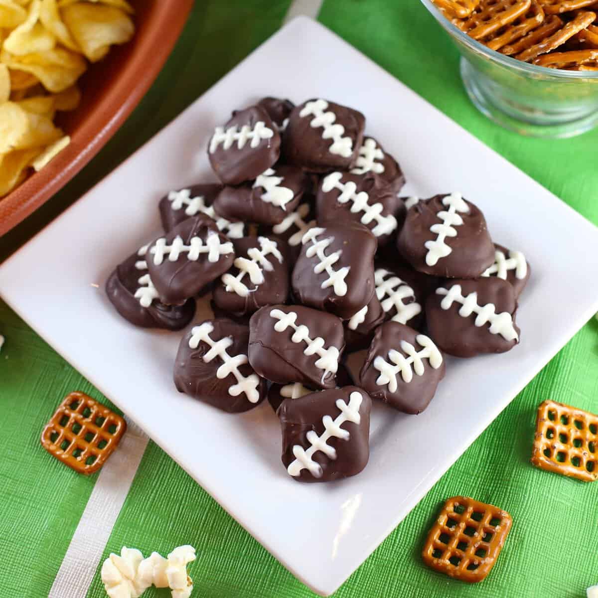 Chocolate covered pretzel footballs for football season