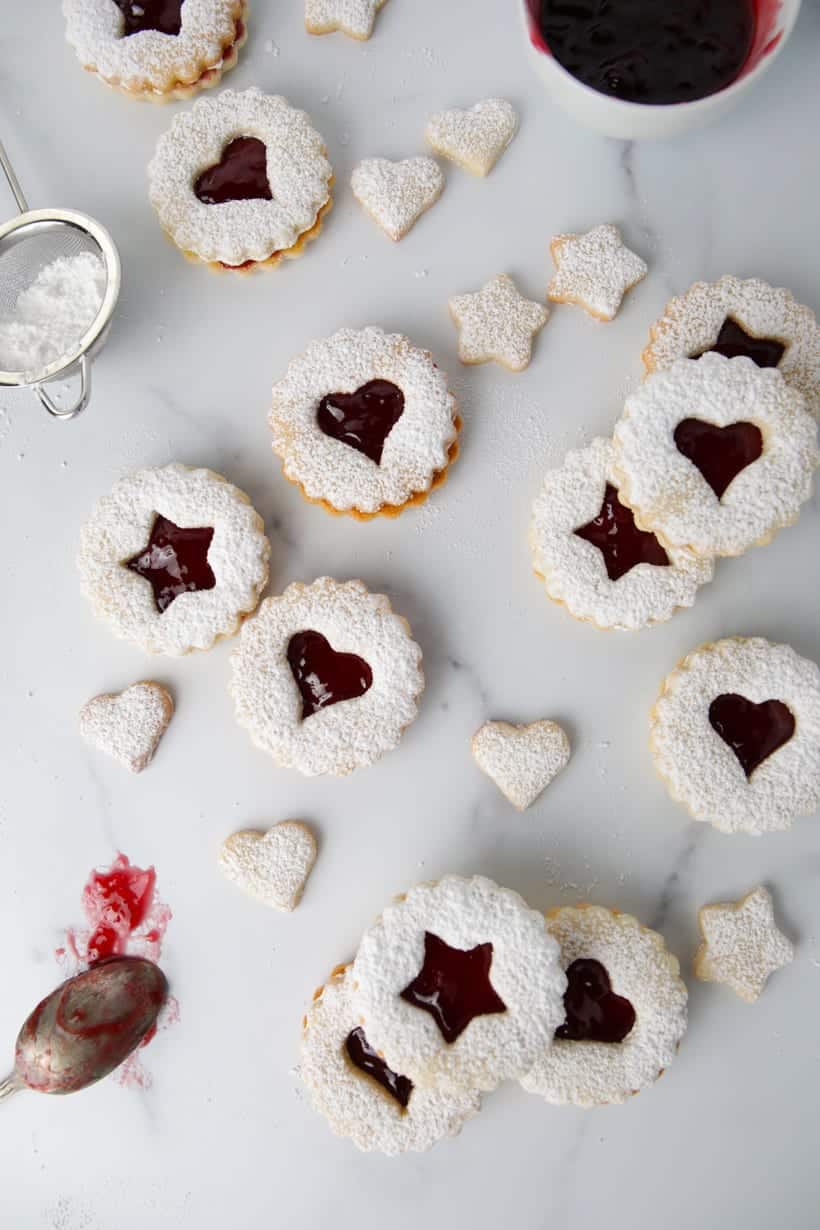 Gluten free raspberry jam filled almond linzer cookies star shaped