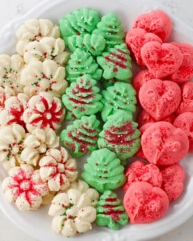 Classic Christmas Spritz cookies made with a cookie press