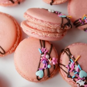 Pink French macarons with strawberry buttercream filling