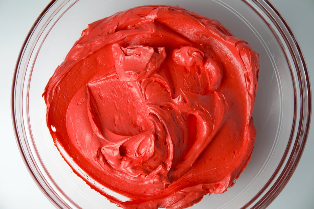 Creamy dreamy sweetened condensed milk buttercream in red