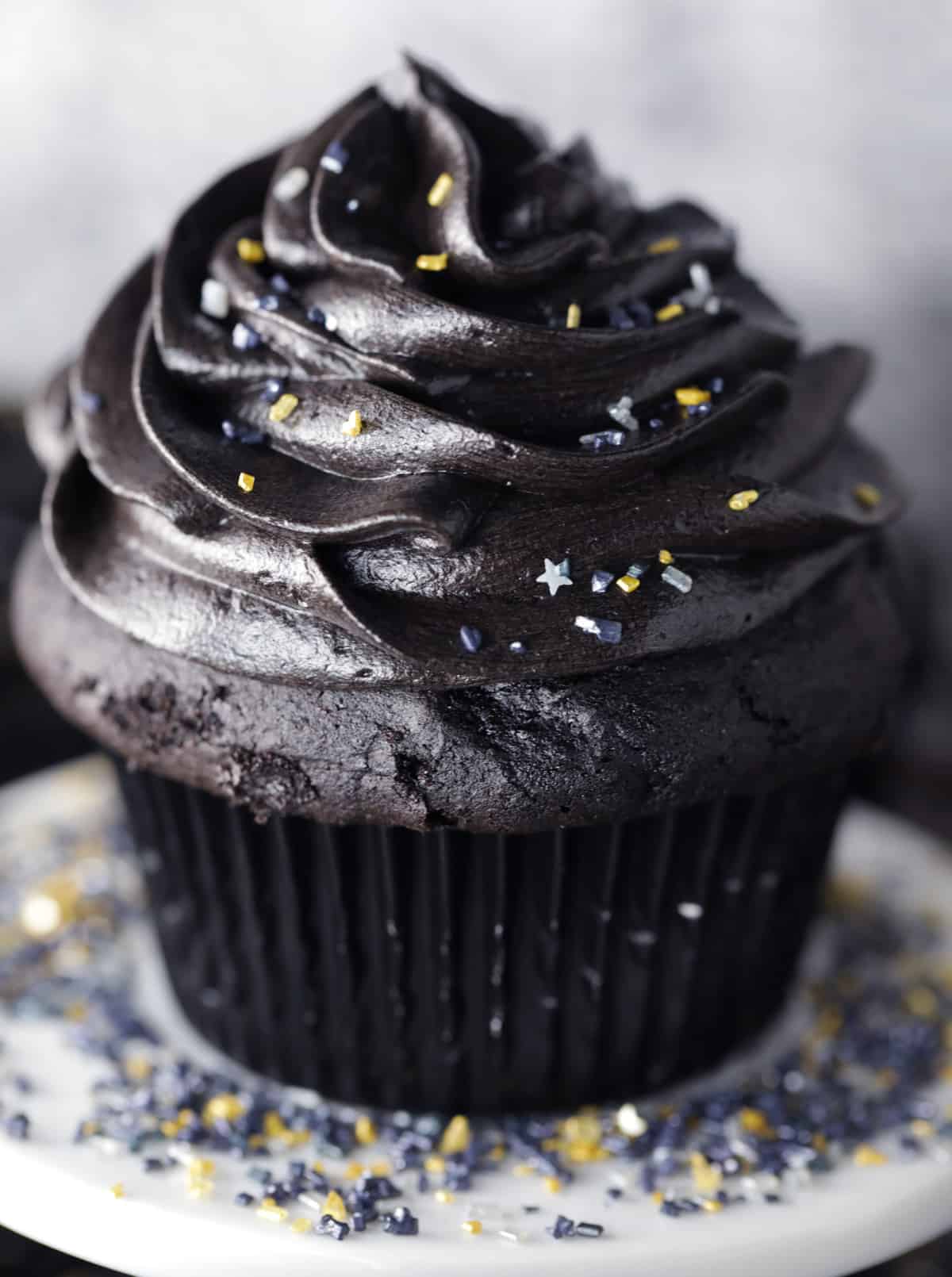 Black frosting on a cupcake.