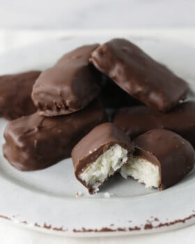 Homemade candy bars on a white plate.