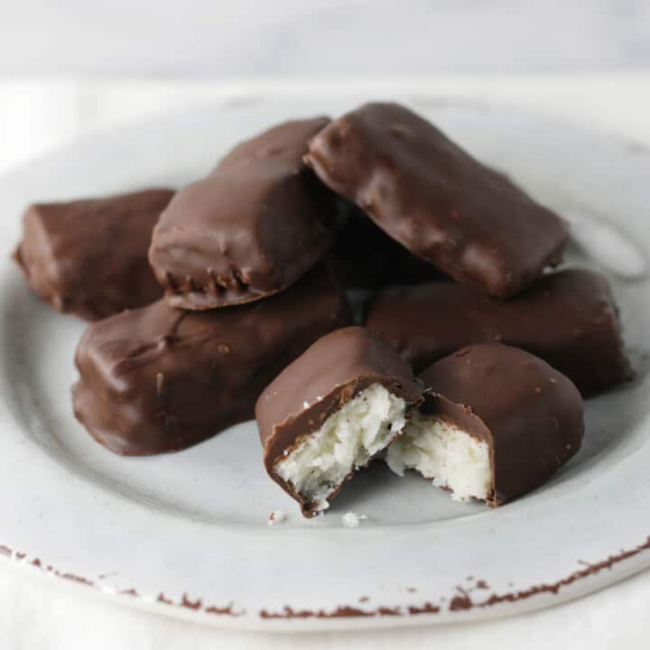 Homemade candy bars on a white plate.