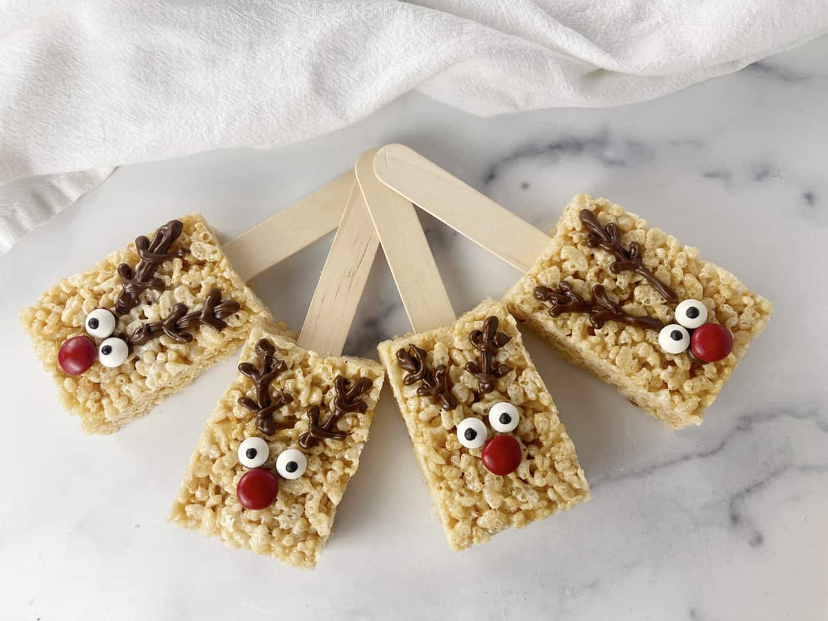 Four super cute reindeer treats on the counter.