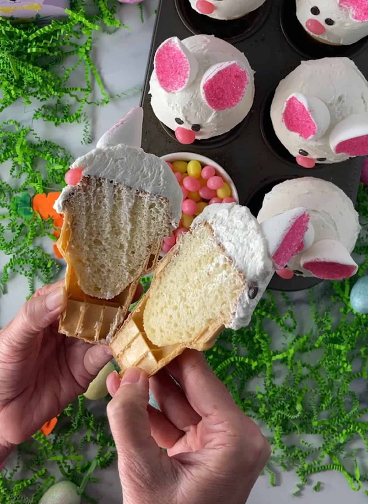A cupcake baked in cone cut open to show the inside of the cake.