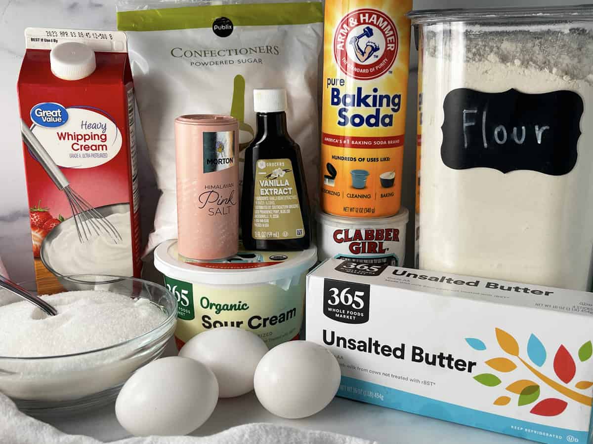 Ingredients needed to make soft sugar cookies on the kitchen counter.