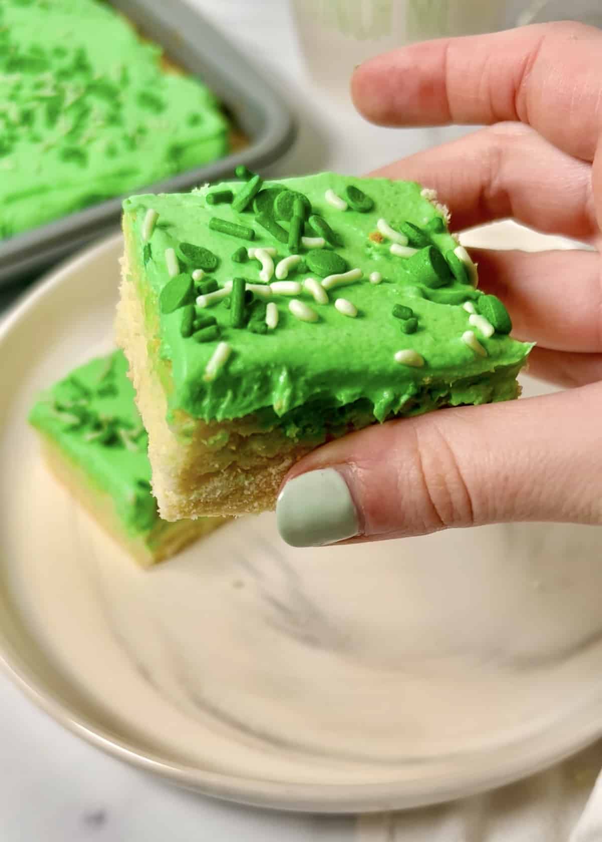 St. Patrick's day cookie bars with green frosting.