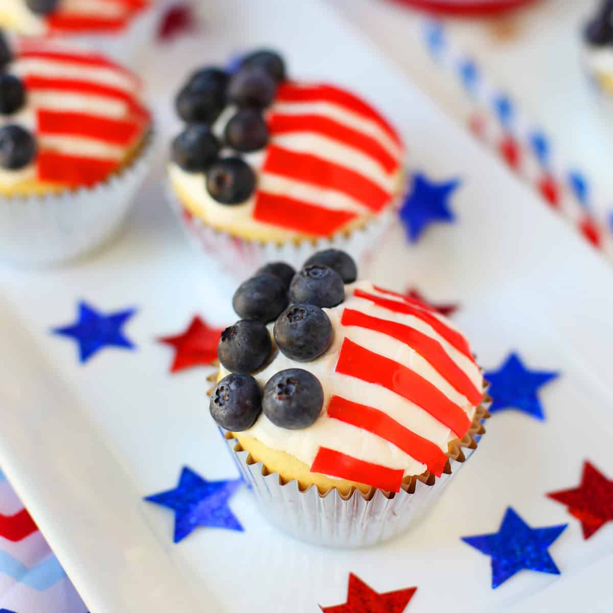 Easy flag cupcakes with blueberries for stars and red fruit rollups for stripes.