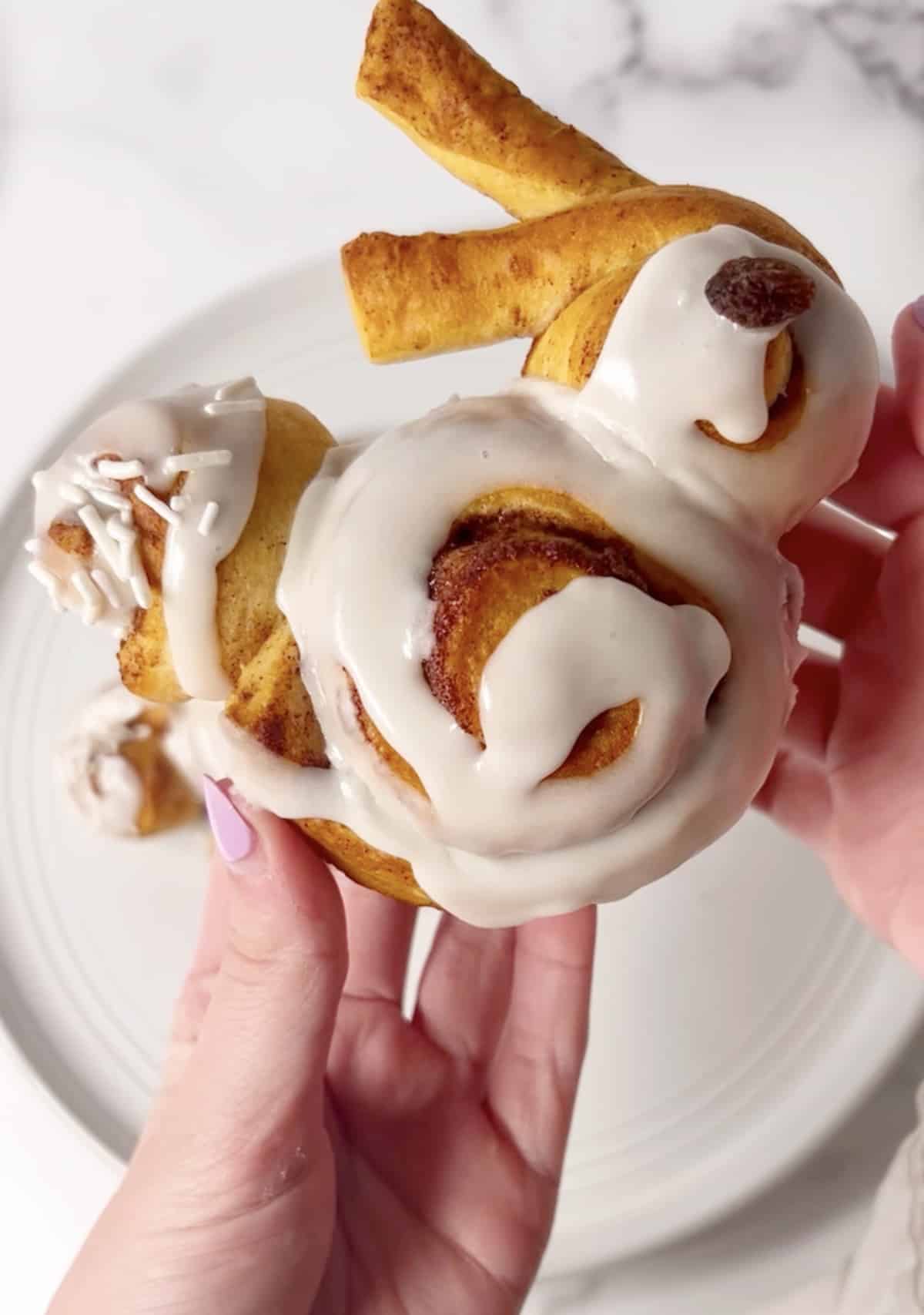 Easy bunny shaped cinnamon roll with raisin eye.