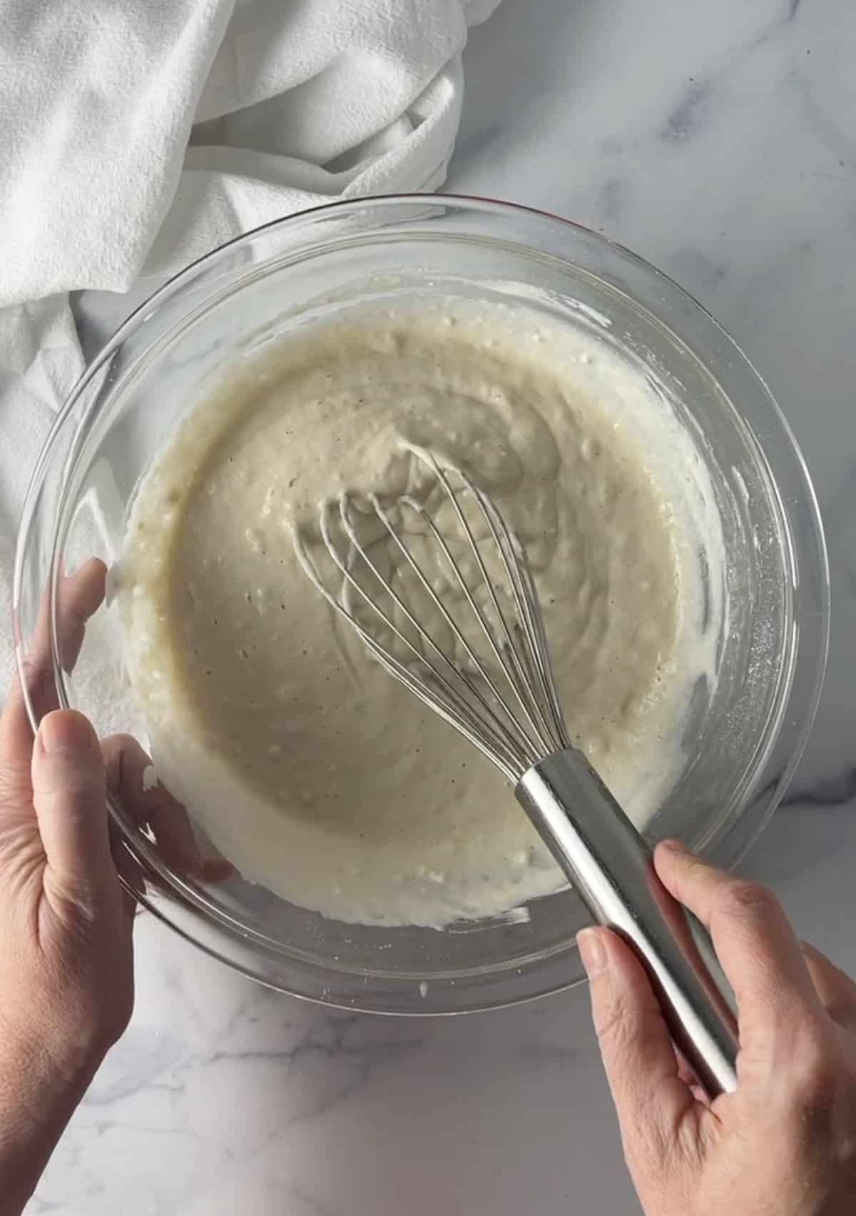 Mixing pancake batter.