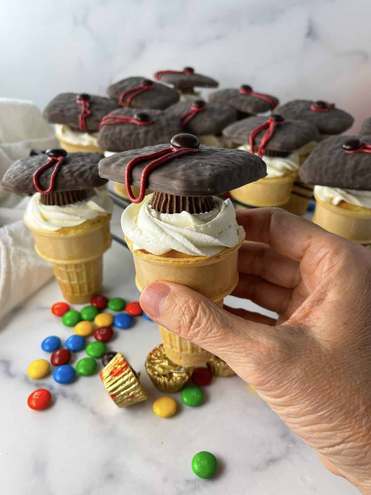 Grad cap cupcakes baked in ice cream cones.