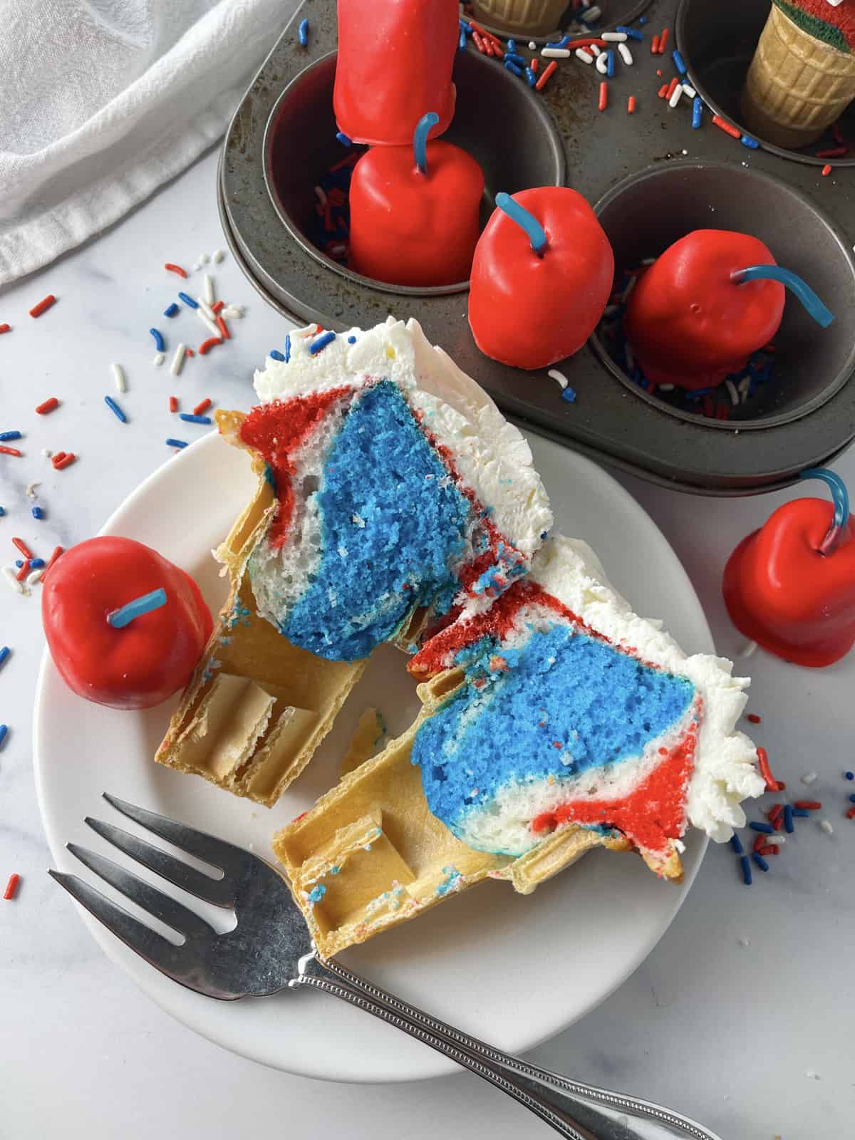 Red, white and blue swirl cake inside Firecracker cupcakes.