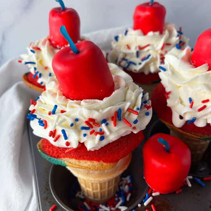 Patriotic ice cream cone cupcakes with edible firecrackers.