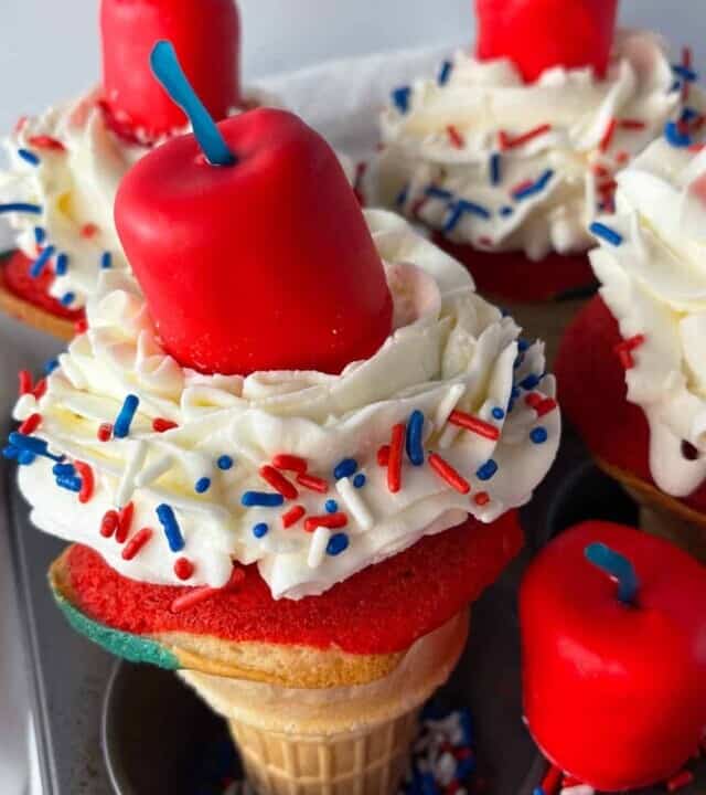 Patriotic ice cream cone cupcakes with edible firecrackers.