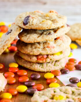 Stack of oatmeal Reese's monster cookies.