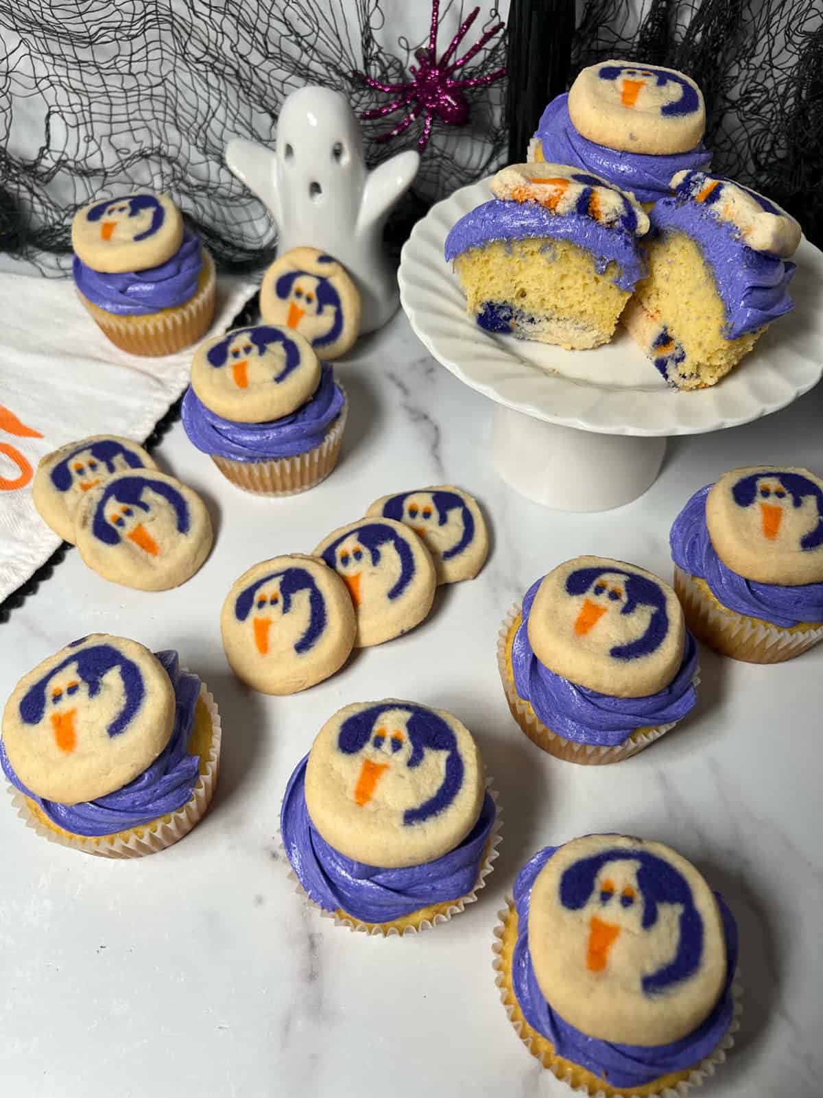 Pillsbury Halloween cookie dough baked in bottom of cupcakes.