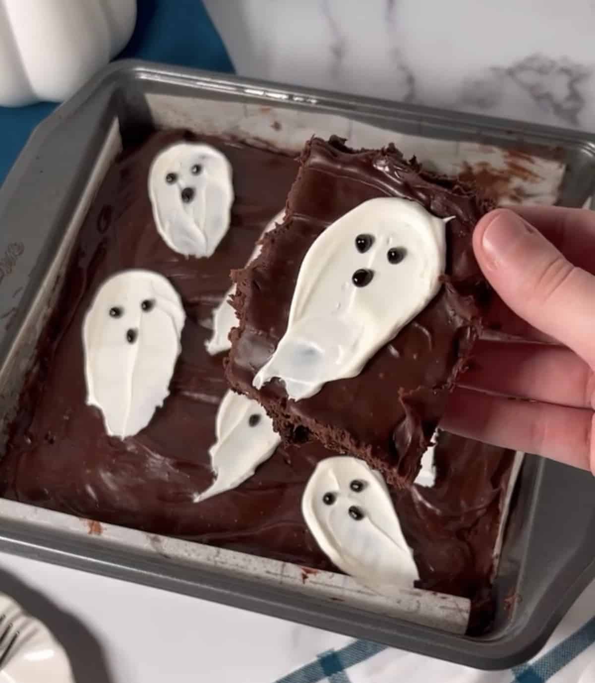 Easy Halloween ghost brownies recipe cut into squares.