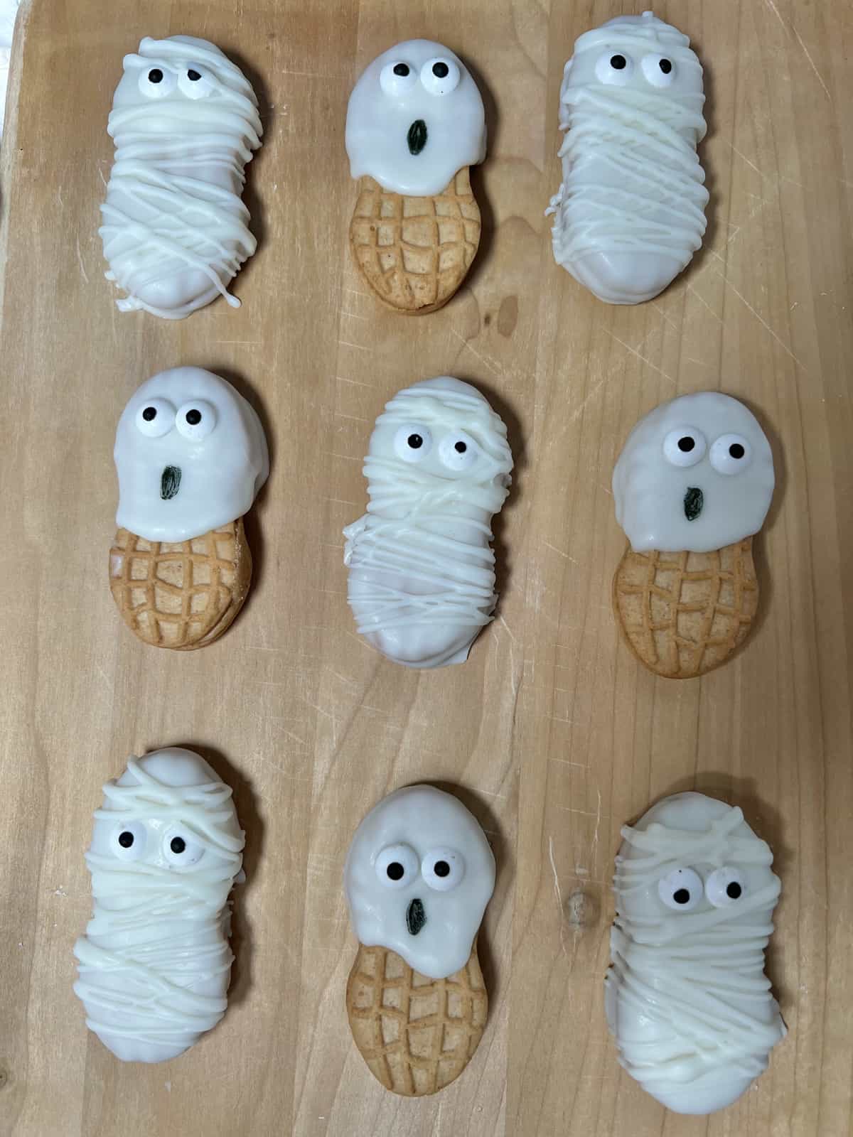 The cutest nutter butter ghost and mummy cookies for Halloween.
