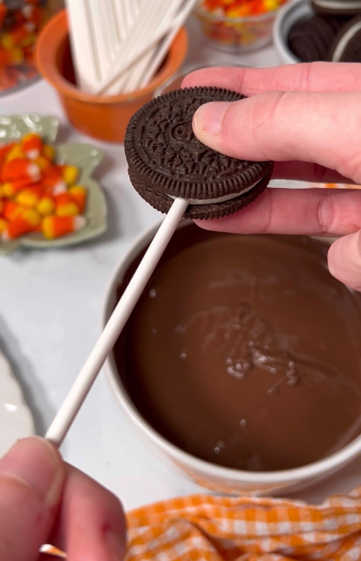 How to put oreo on popsicle stick.