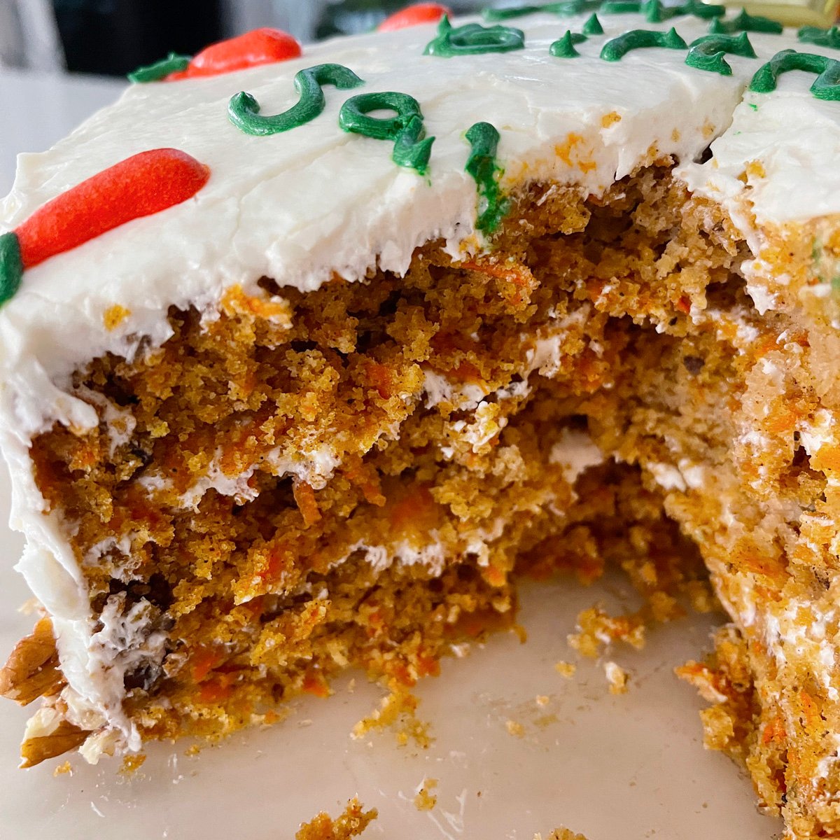 Three layer carrot cake with cream cheese frosting.