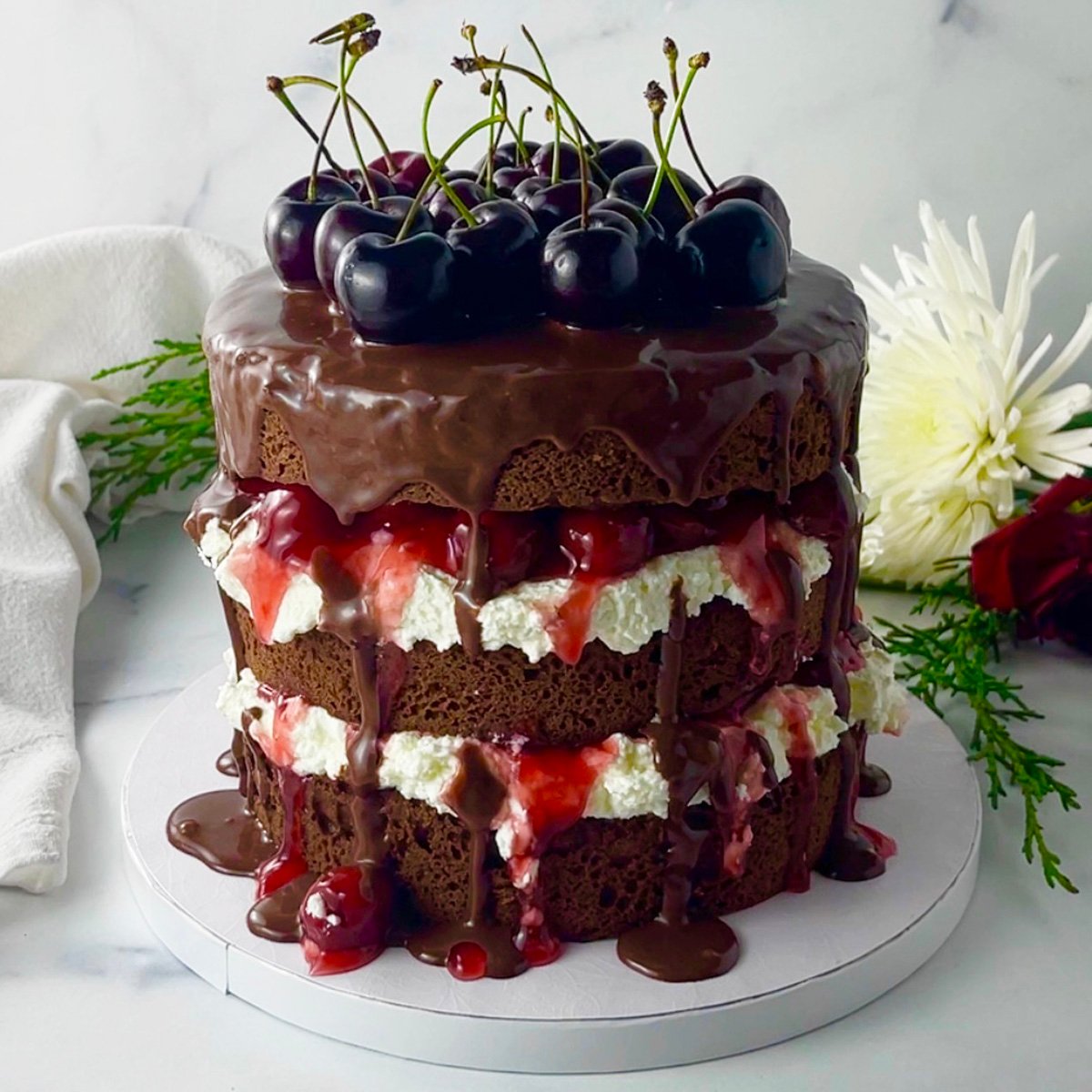 Black forest cake with chocolate ganache topping.