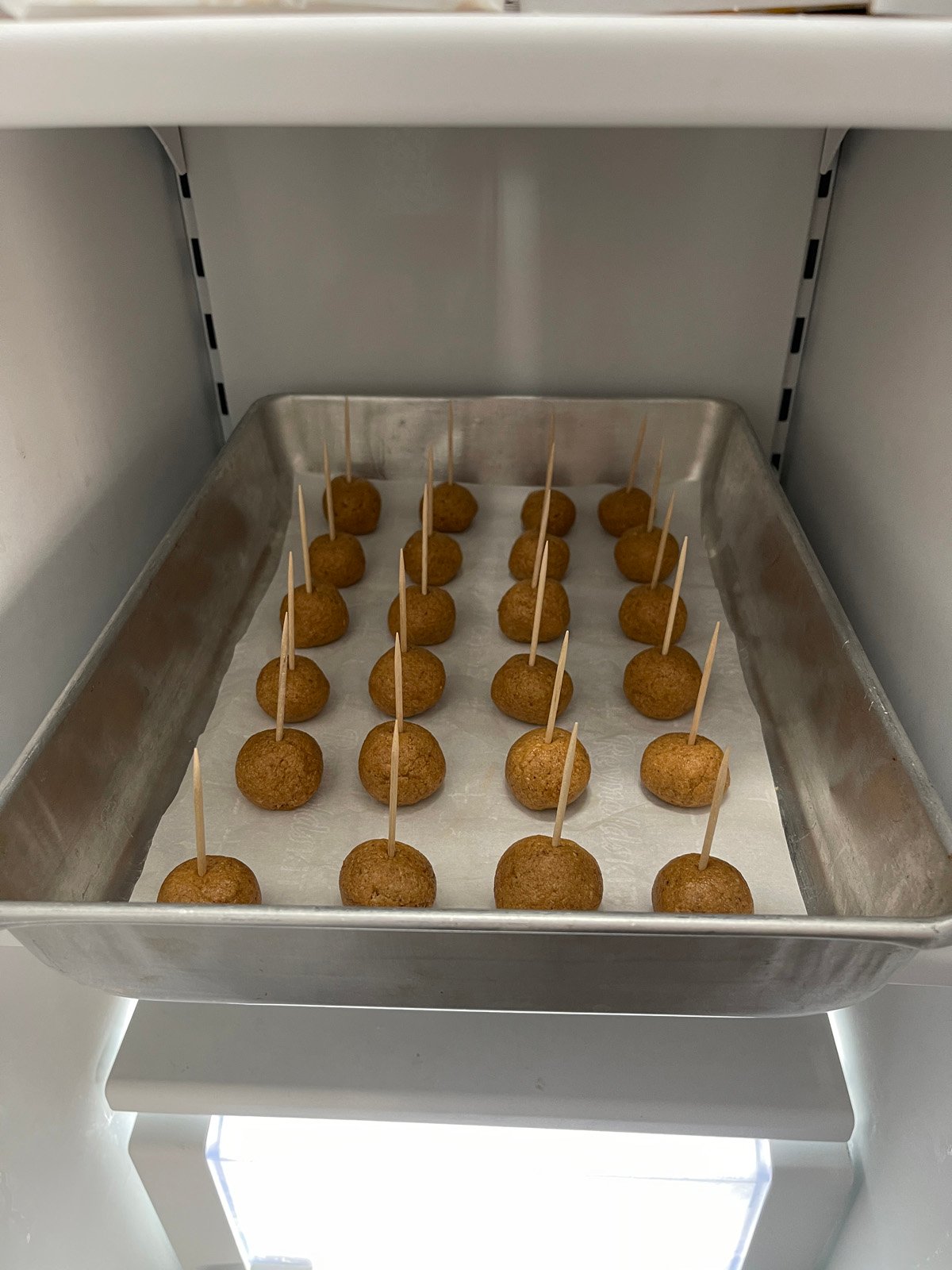 Peanut butter balls in the freezer.