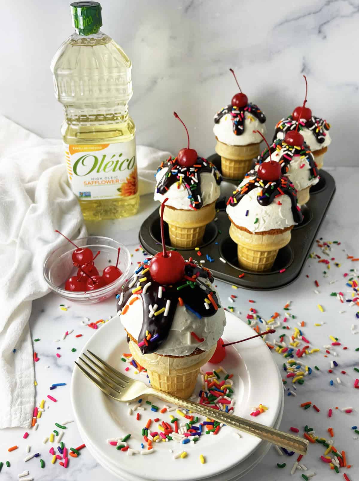 The cutest hot fudge sundae cupcakes.