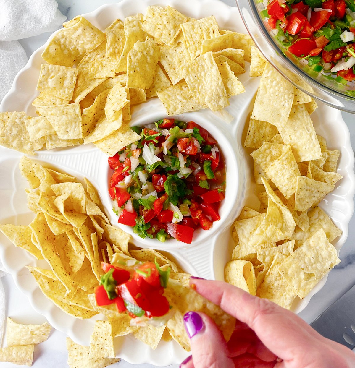 Homemade salsa with chips.